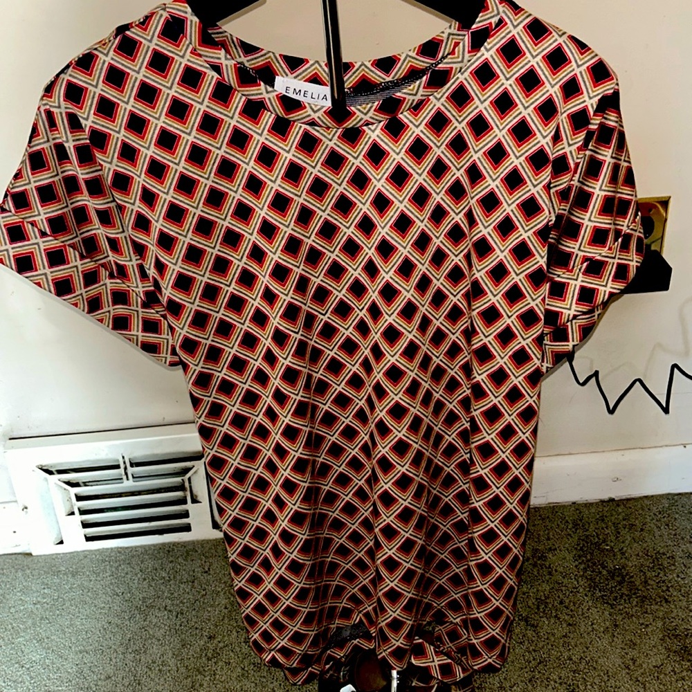 Emilia blue and red checked top with tie in the back.